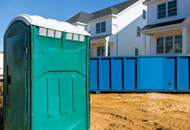 work site necessities a cluster of portable toilets providing relief for workers